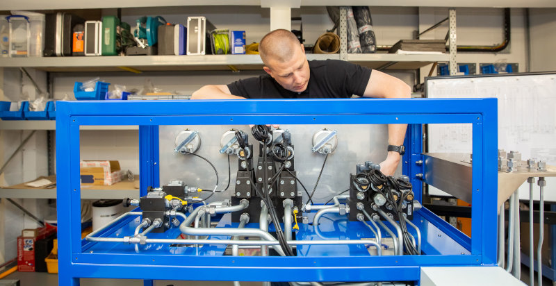 One of Zeus Hydratech's Hydraulic Engineers completing work on a Bespoke Power Pack.